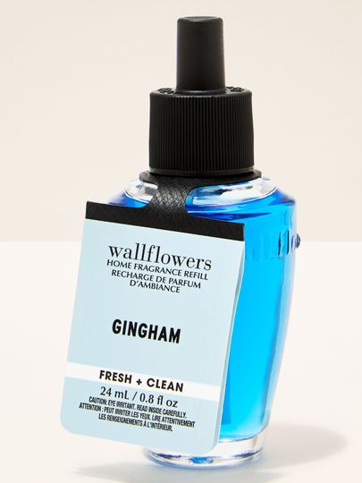 Reumplere Wallflowers Gingham cu aromă fresh & clean, în flacon albastru intens de 24 ml.