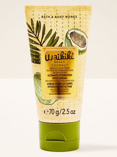 Cremă mini pentru corp Waikiki Beach Coconut în tub deschis, cu motiv tropical de cocos și capac verde.