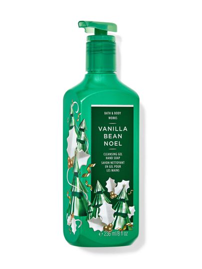 Zelené gelové mýdlo na ruce „Vanilla Bean Noel“ s motivem vánočních stromků a cesmíny. Bath & Body Works.