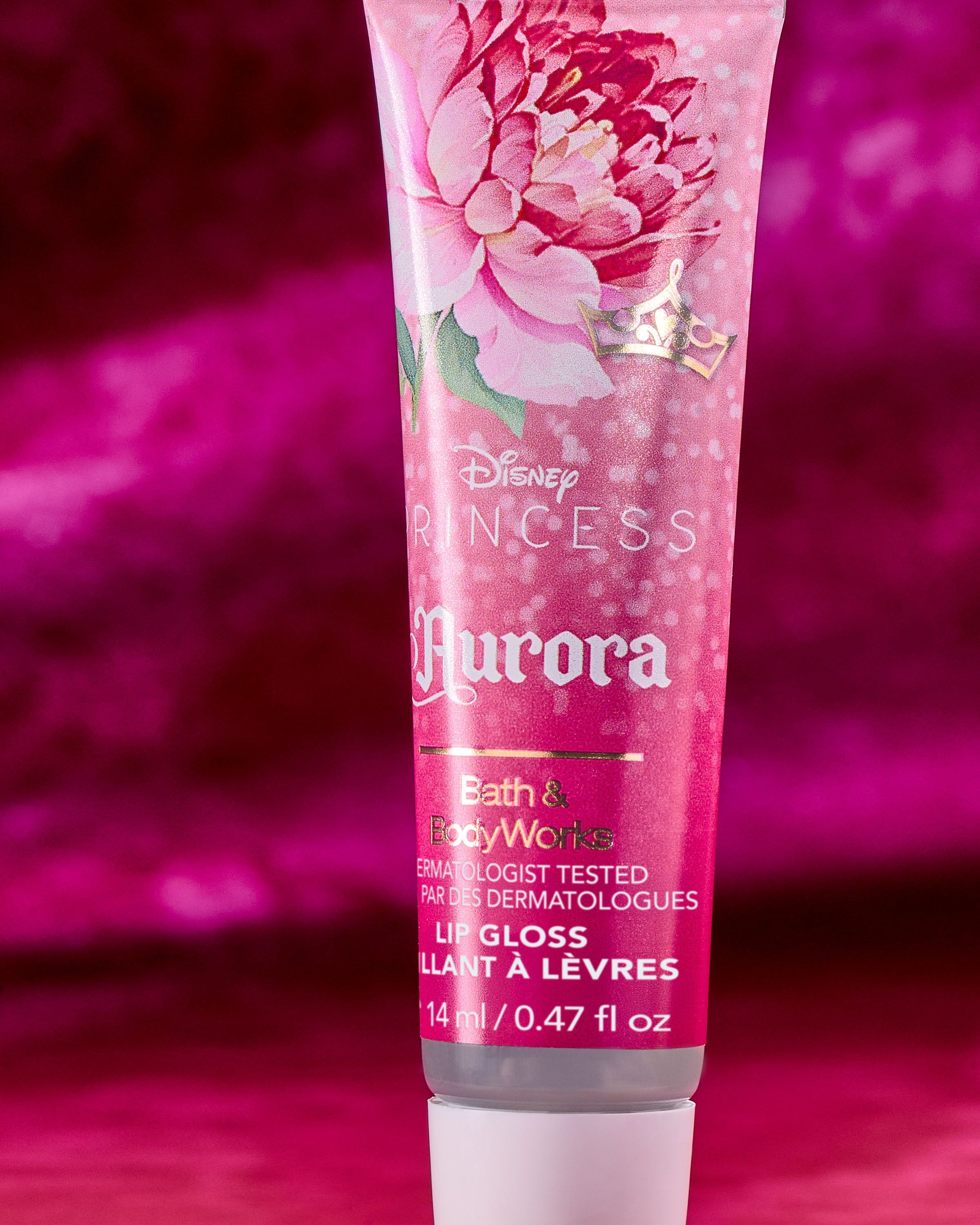 Gloss de buze Aurora Disney Princess – strălucire roz și design floral elegant.