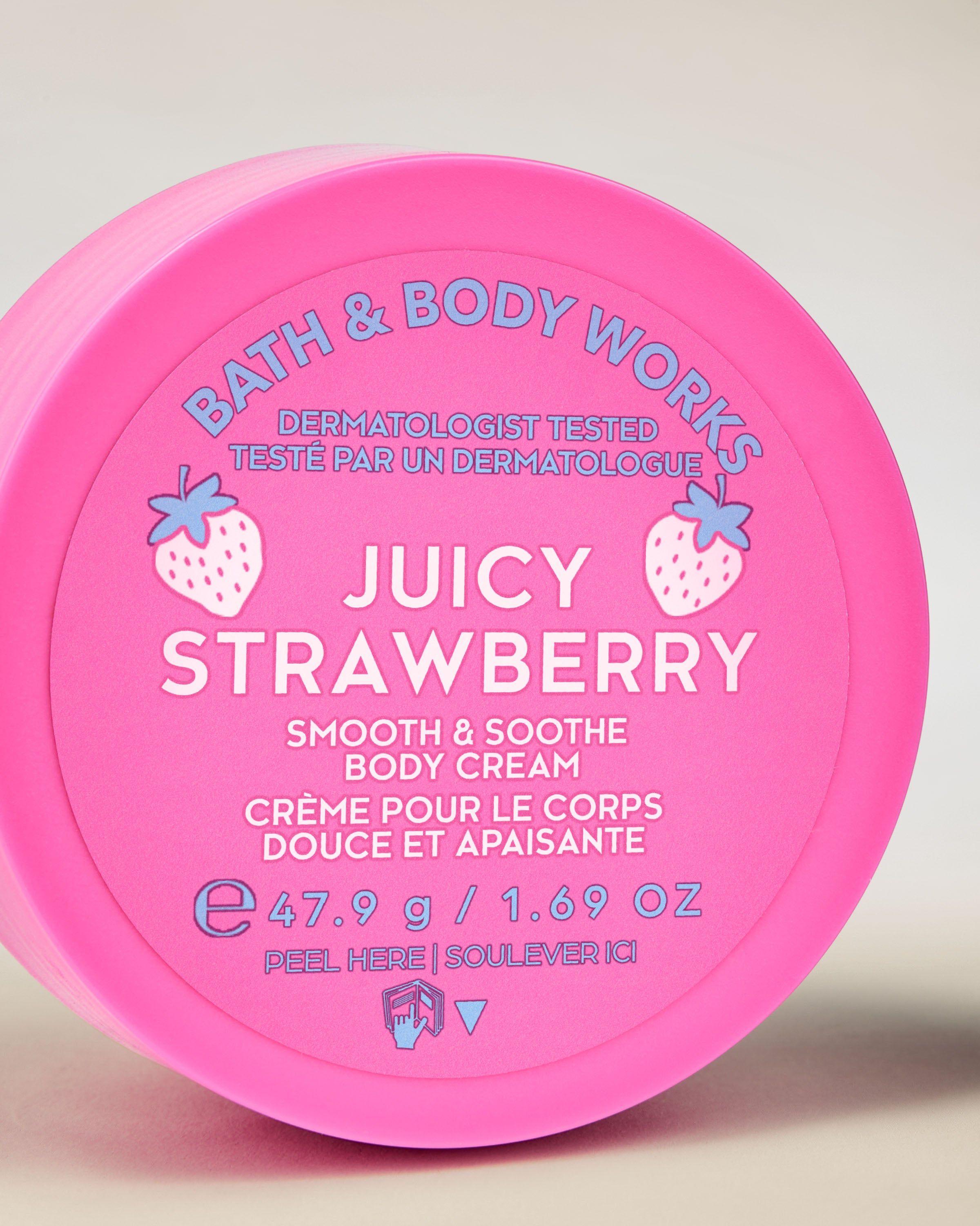 Cremă de corp Juicy Strawberry în ambalaj roz