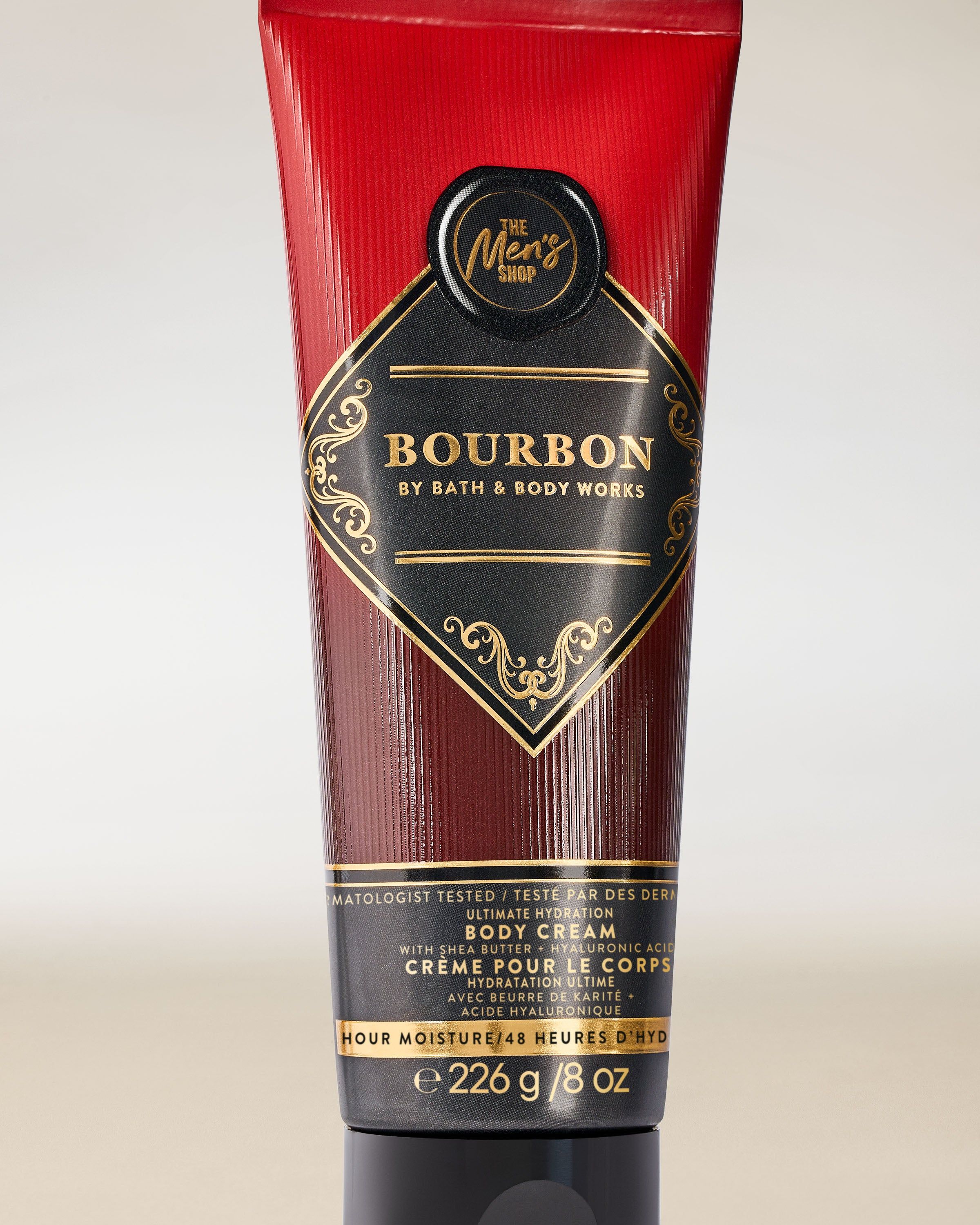 Bath & Body Works Bourbon – cremă de corp pentru bărbați, într-un tub negru și burgund cu etichetă decorativă.