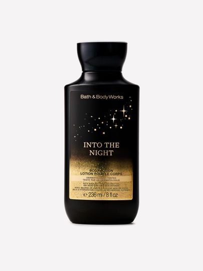 Loțiune de corp Into the Night Bath & Body Works în recipient negru cu motiv auriu de stele