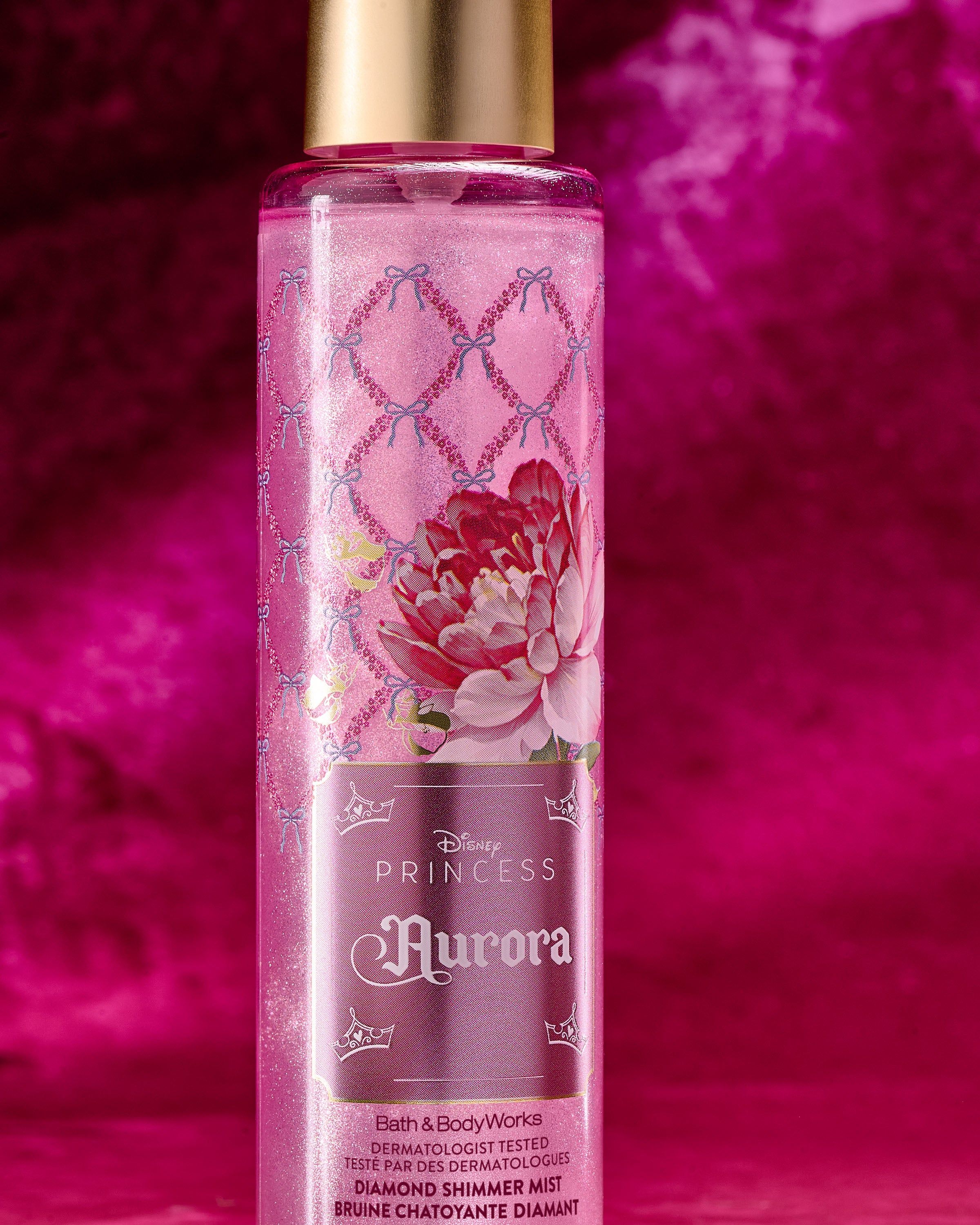 Aurora Diamond Shimmer Mist – sticlă roz strălucitoare cu particule shimmer și prospețime delicată.