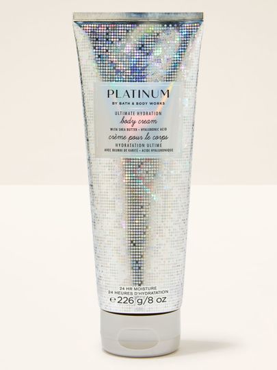 Stříbrný tělový krém se třpytivým motivem a nápisem "Platinum", Bath & Body Works.