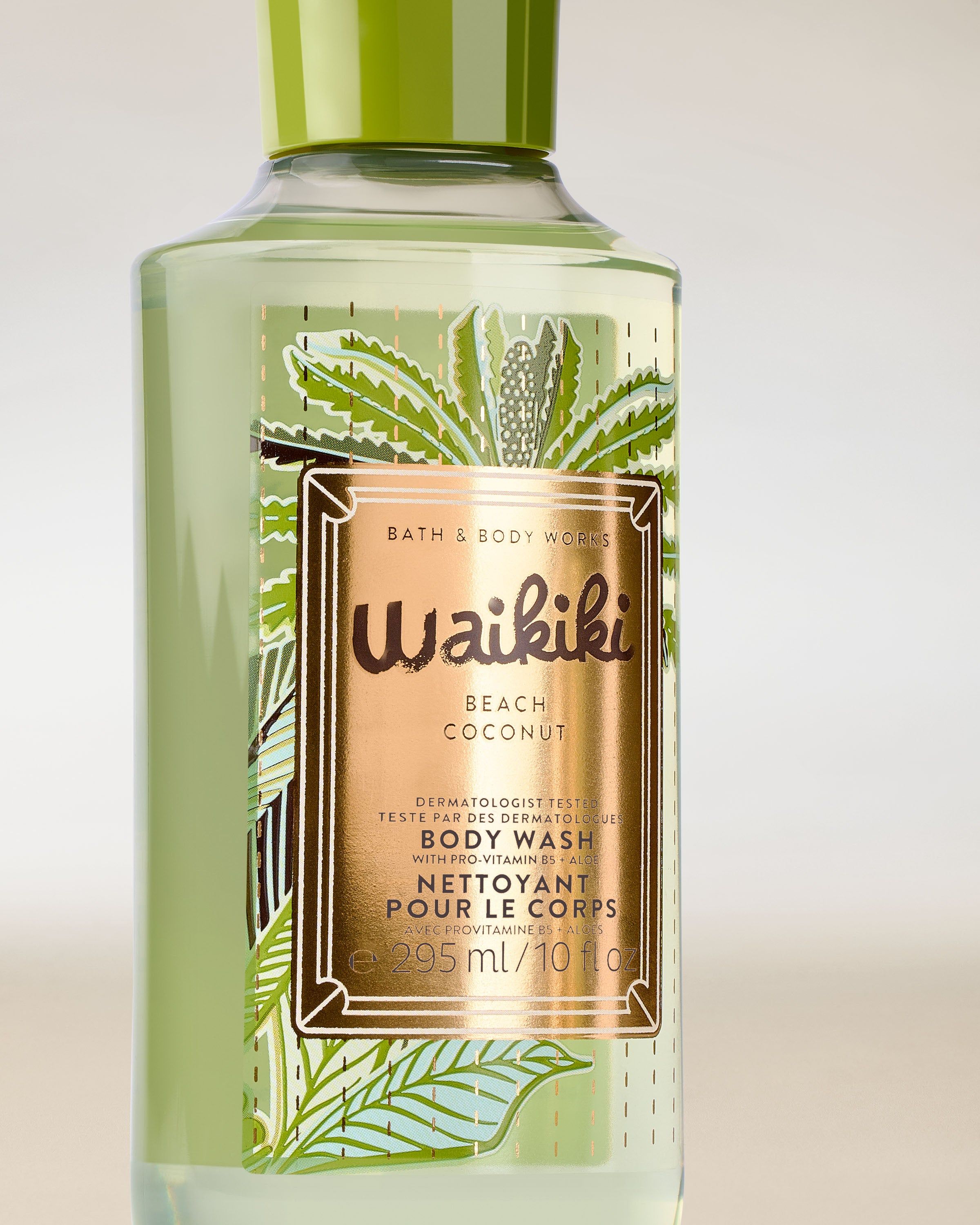 Gel de duș Waikiki Beach Coconut în sticlă verde, cu etichetă tropicală și capac verde.