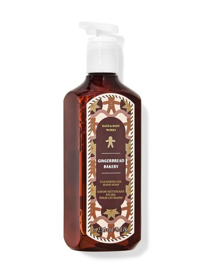 Hnědé gelové mýdlo na ruce „Gingerbread Bakery“ s motivem perníkových panáčků a hvězd. Bath & Body Works.