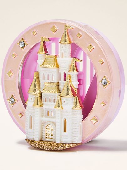 Suport pentru disc parfumat – un castel de poveste în nuanțe roz‑aurii pentru un interior auto elegant.