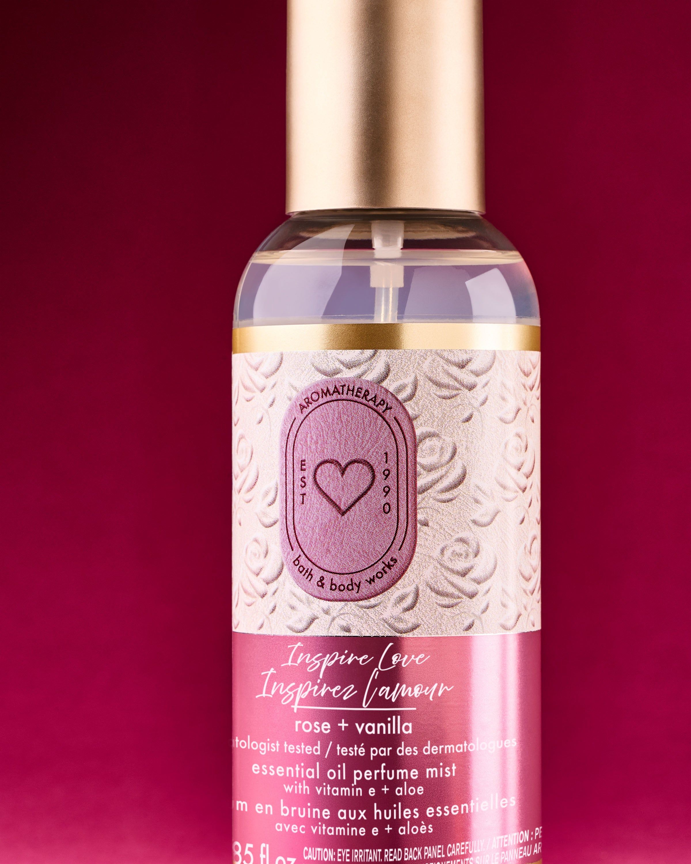 Inspire Love rose + vanilla – spray aromatizat roz‑vanilie în sticlă elegantă cu capac auriu.