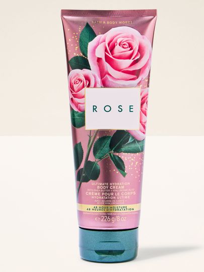 Cremă de corp ROSE Bath & Body Works în tub roz metalizat cu trandafiri – eleganță clasică și proaspătă.