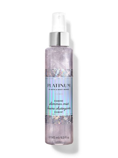 Třpytivý sprej "Platinum" s částečkami třpytek ve stříbrném, holografickém obalu. Bath & Body Works.