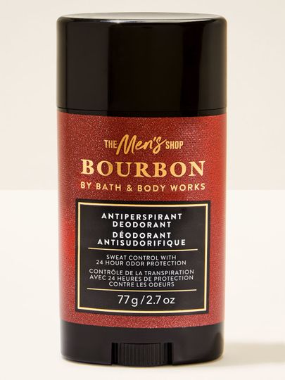 Deodorant stick Bath&Body Works Bourbon. Stick negru cu etichetă roșie strălucitoare cu inscripții.