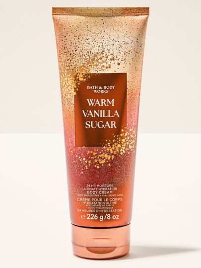 Krem do ciała Bath & Body Works Warm Vanilla Sugar w złoto‑waniliowej tubie 226 g.