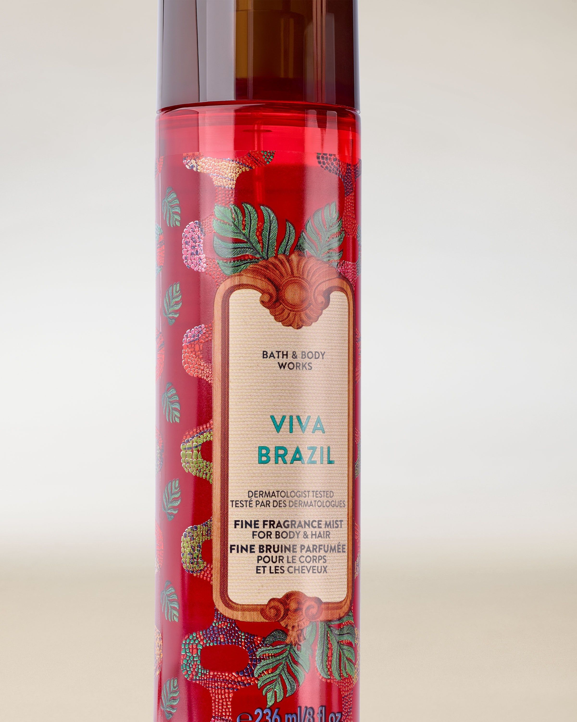 Mgiełcă parfumată Viva Brazil de la Bath & Body Works, flacon roșu cu atomizor și grafică exotică decorativă.