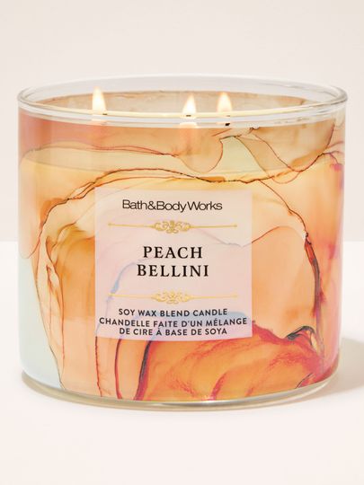 Lumânare Peach Bellini Bath & Body Works în borcan cu design abstract în tonuri de piersică