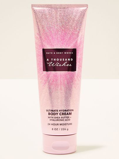 Cremă de corp A Thousand Wishes Bath & Body Works într‑un tub roz cu model strălucitor