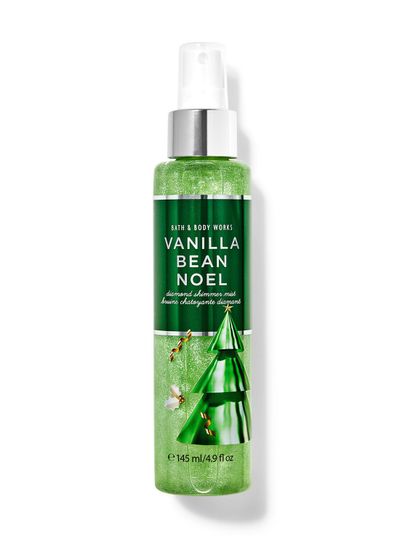 Rozjasňující vonná mlha Vanilla Bean Noel v zelené lahvi se vzorem vánočního stromku. Bath&Body Works.