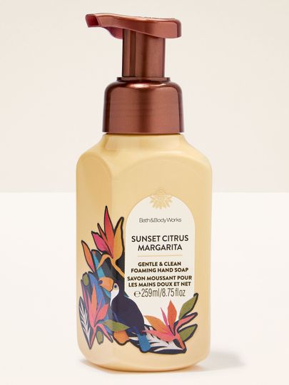 Sunset Citrus Margarita – săpun spumant galben cu pompă arămie și etichetă tropicală colorată cu tucan.