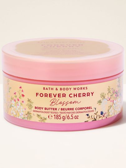 Unt de corp Bath & Body Works Forever Cherry Blossom 185 g, în recipient roz cu decor floral.
