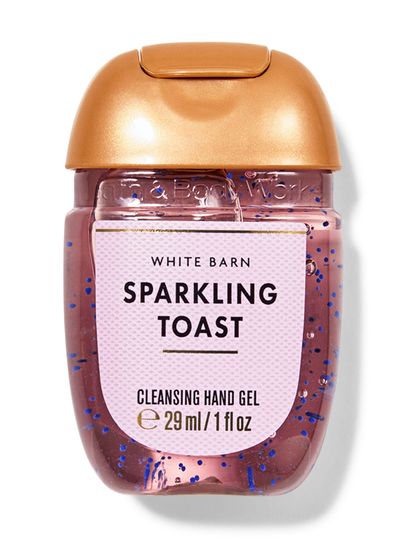 Gel antibacterian Sparkling Toast Bath & Body Works în recipient roz cu capac auriu