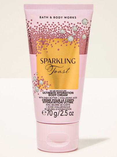 Cremă mini pentru corp Sparkling Toast Bath & Body Works în tub roz cu etichetă aurie strălucitoare