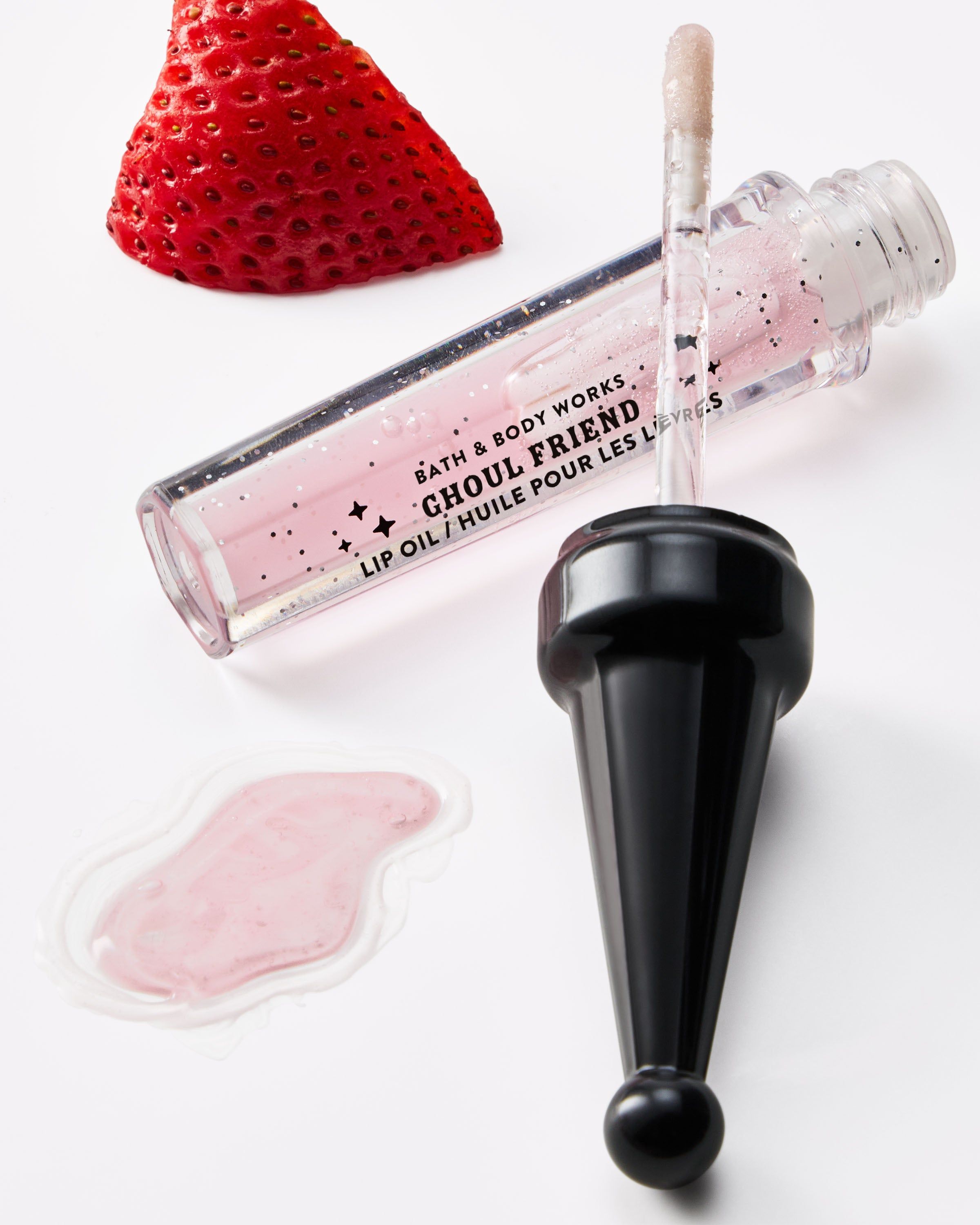 Luciu de buze Bath & Body Works Ghoul Friend cu particule strălucitoare