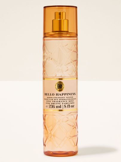 Bath & Body Works Hello Happiness – spray în sticlă texturată piersicie cu pulverizator auriu.