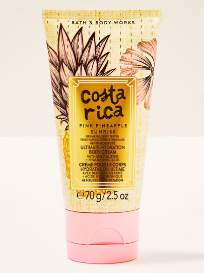 Cremă mini pentru corp Costa Rica Pink Pineapple Sunrise în tub deschis cu grafică tropicală și detalii roz.