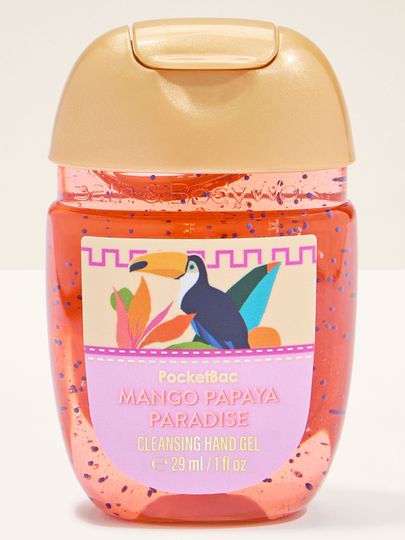 PocketBac Mango Papaya Paradise – gel de mâini în recipient portocaliu cu capac auriu și etichetă tropicală.