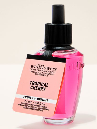Rezerve pentru priză Wallflowers Tropical Cherry cu ulei roz intens și aromă fructată.