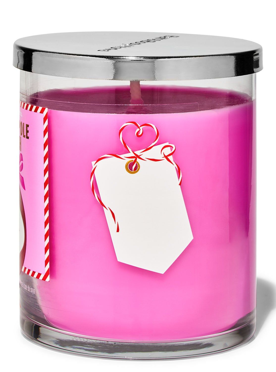 Svíčka „North Pole Punch” s prázdnou bílou dárkovou visačkou přivázanou na provázek ve tvaru srdce, Bath & Body Works.