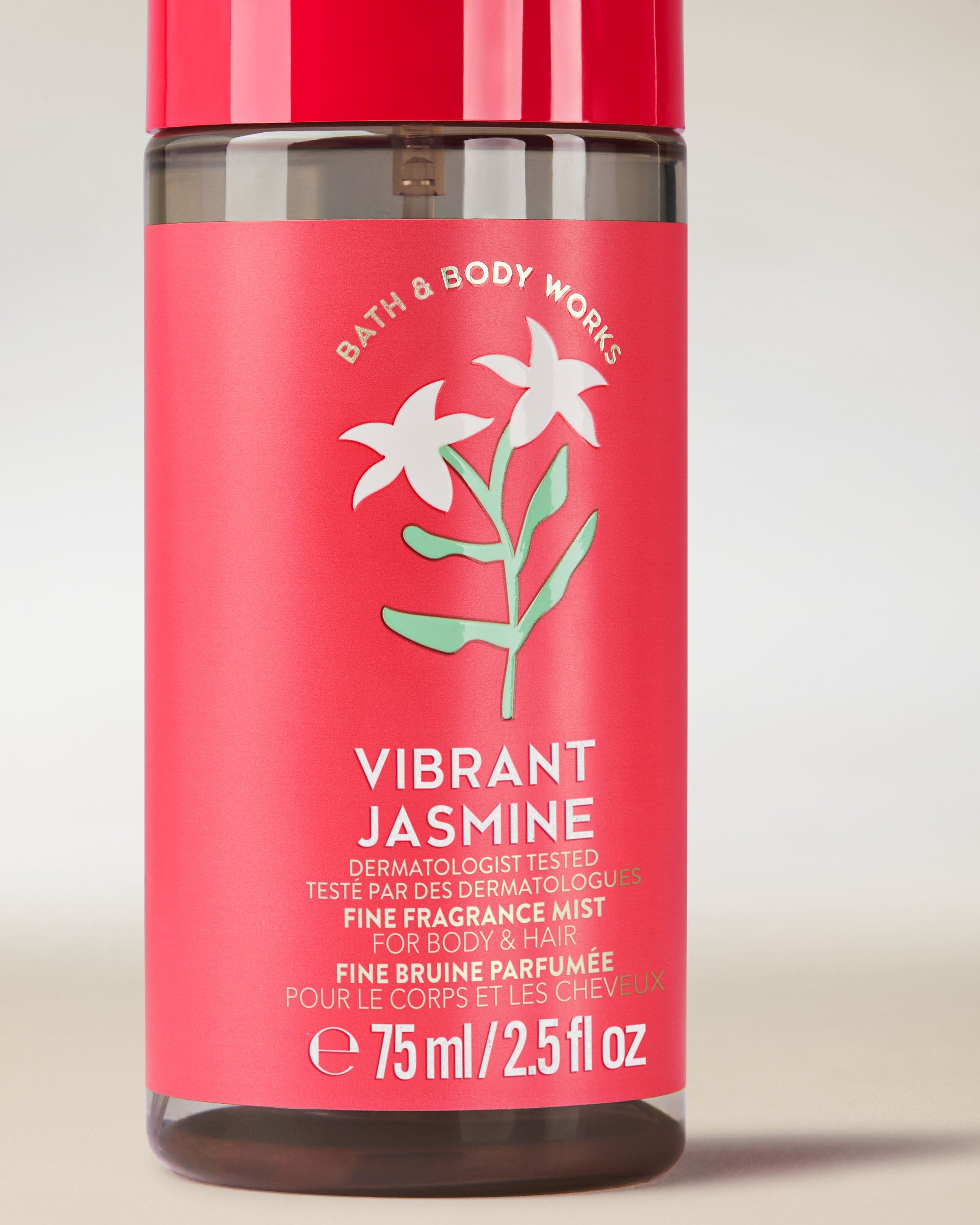 Ceață parfumată pentru corp și păr Vibrant Jasmine într‑o sticlă roșie