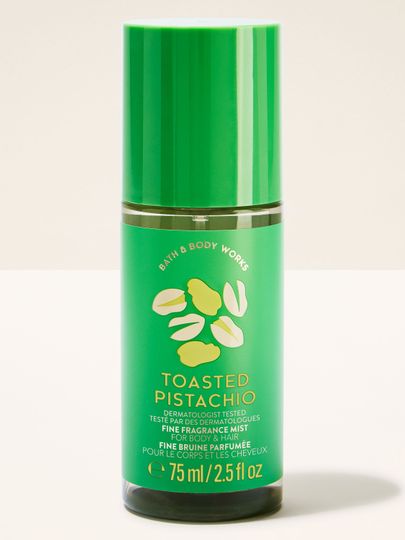 Ceață parfumată pentru corp și păr Toasted Pistachio într‑o sticlă verde