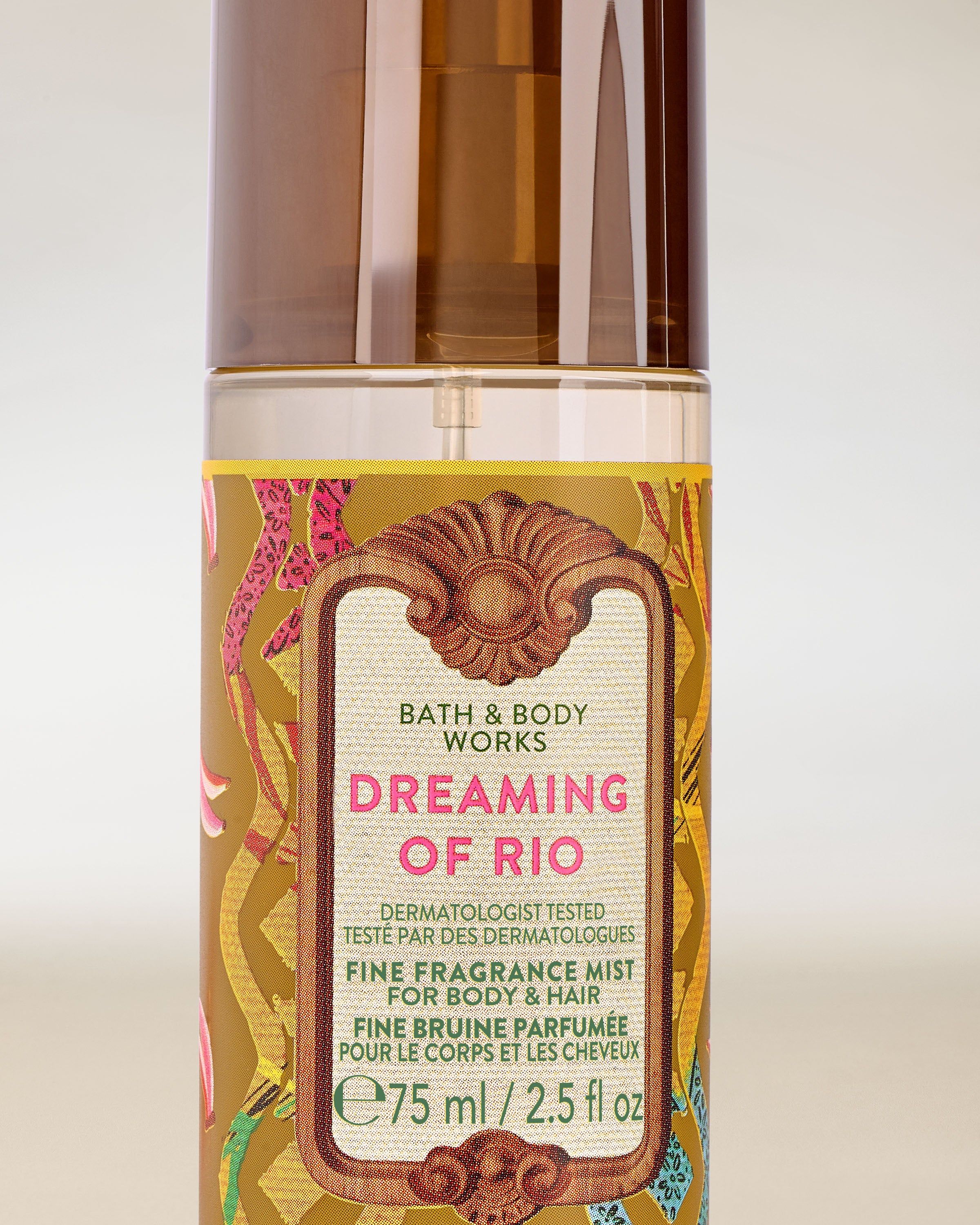 Mini spray Bath & Body Works Dreaming of Rio cu etichetă vibrantă și capac maro.