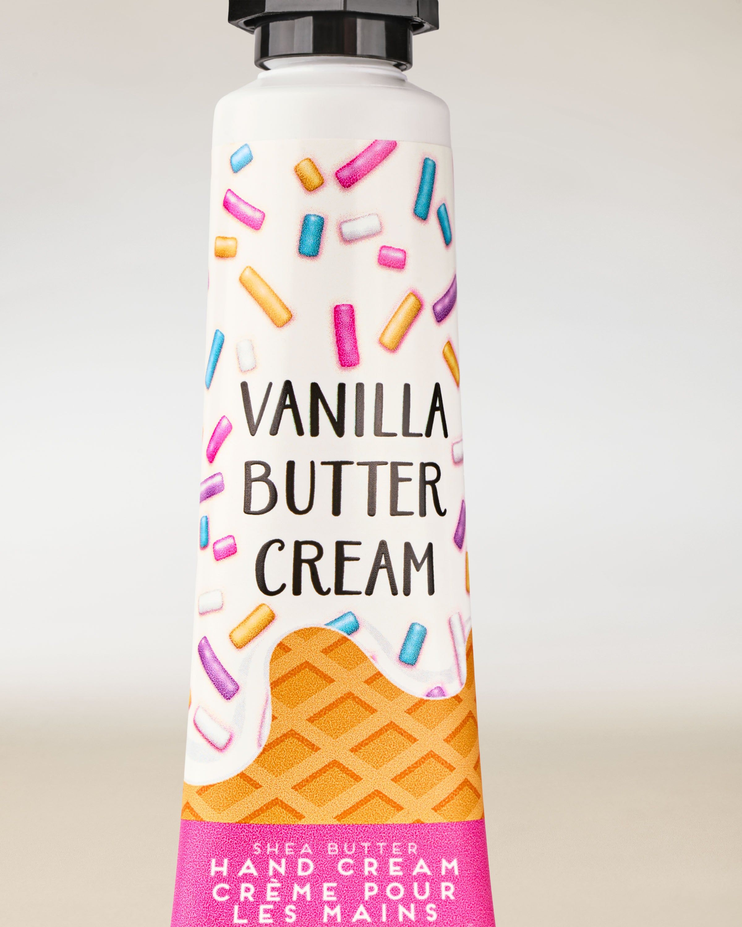 Cremă de mâini Bath & Body Works Vanilla Butter Cream în tub colorat, 29 ml.