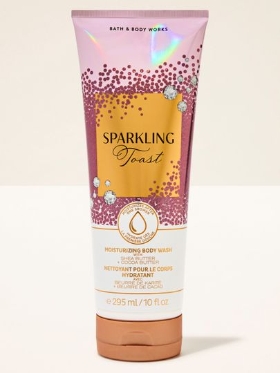 Gel de duș Sparkling Toast Bath & Body Works în tub roz‑auriu cu etichetă strălucitoare