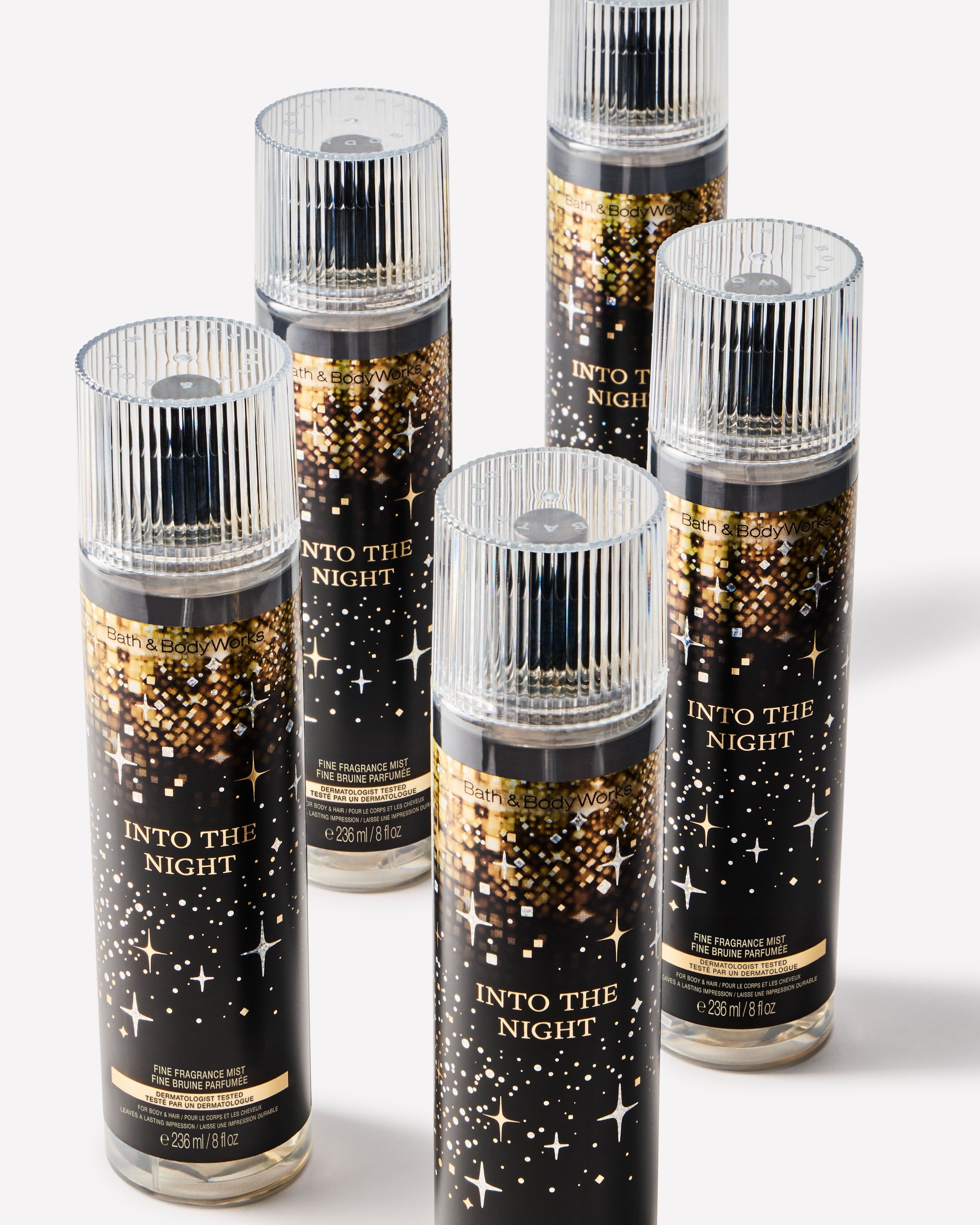Mist parfumat pentru corp Into the Night Bath & Body Works în flacon negru cu motiv auriu de stele