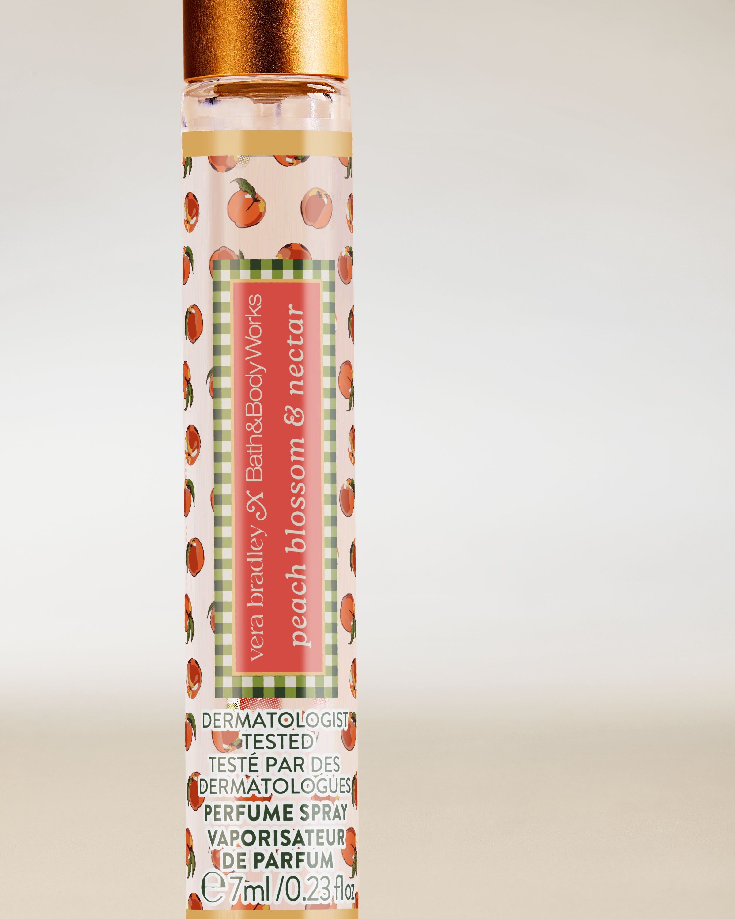 Bath & Body Works Peach Blossom & Nectar – mini parfum spray într-un flacon subțire cu motiv de piersici.