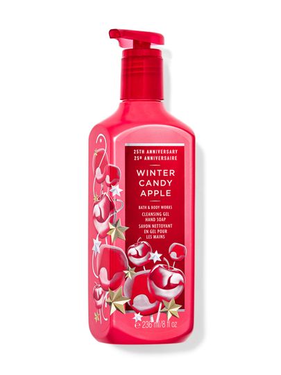 Růžové gelové mýdlo na ruce „Winter Candy Apple“ s motivem lesklých jablek a hvězd. Bath & Body Works.