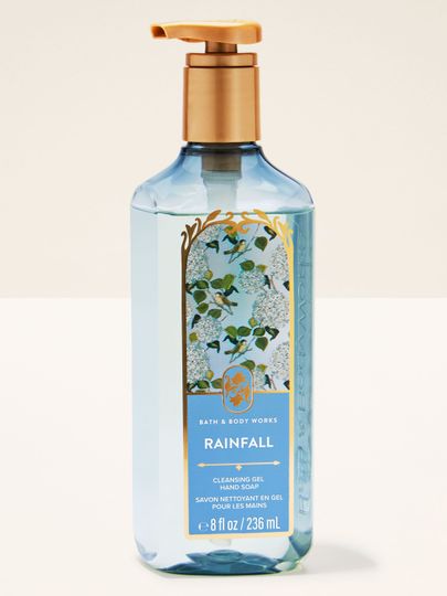 Bath & Body Works Rainfall – gel de mâini în sticlă albastră cu etichetă florală