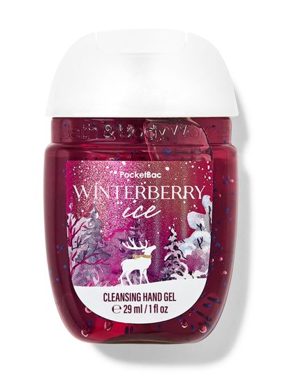 Cestovní čisticí gel na ruce se třpytkami a zimní etiketou s jelenem a lesním motivem. Bath & Body Works.