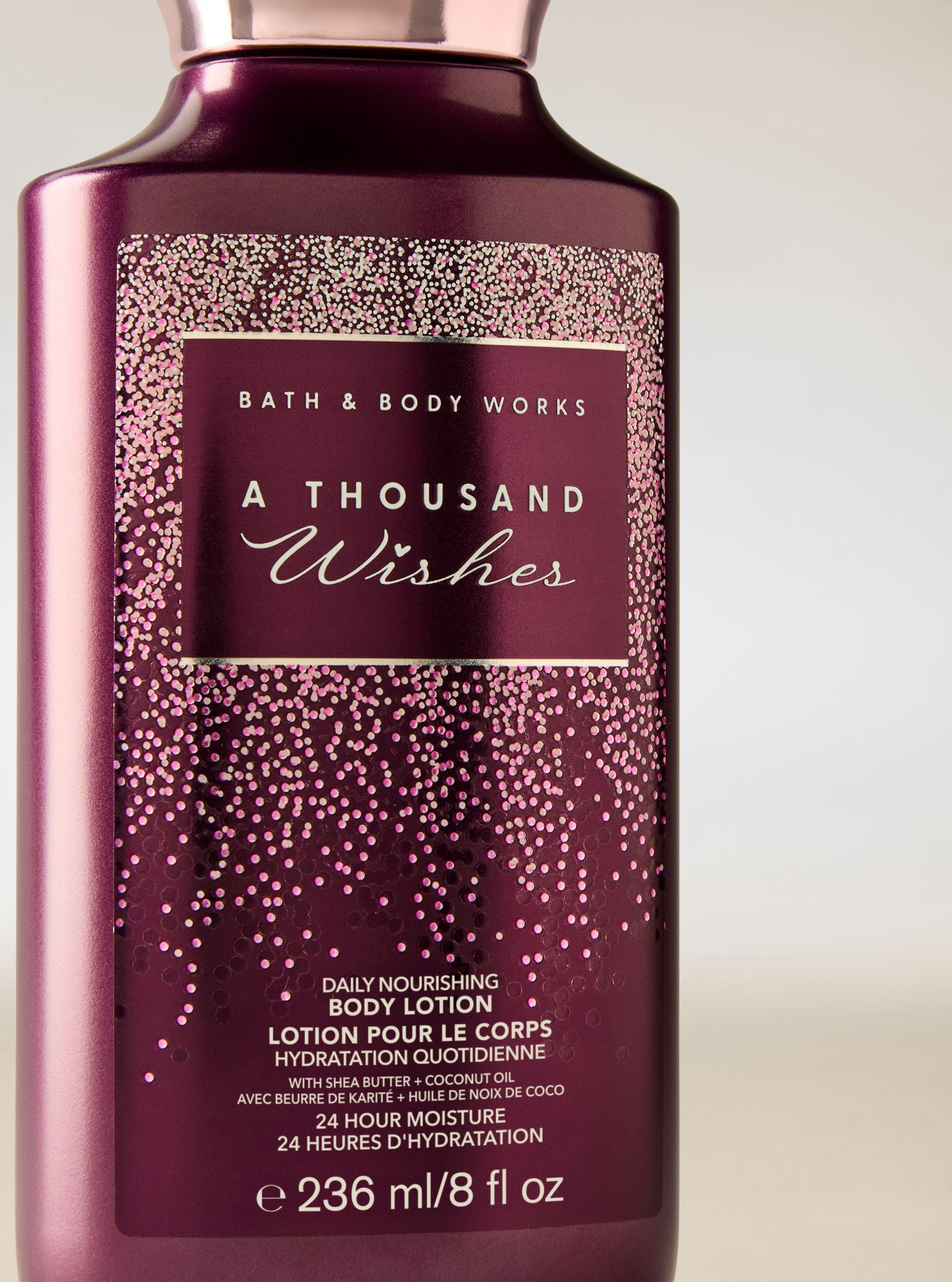 Loțiune de corp Bath & Body Works A Thousand Wishes în flacon mov cu etichetă strălucitoare