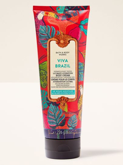 Cremă de corp Viva Brazil în tub colorat, cu imprimeu tropical și frunze vibrante pe fundal roșu.