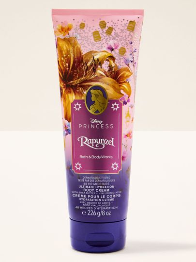 Cremă de corp Rapunzel Disney Princess – design roz‑mov cu accente aurii și hidratare intensă 48h.