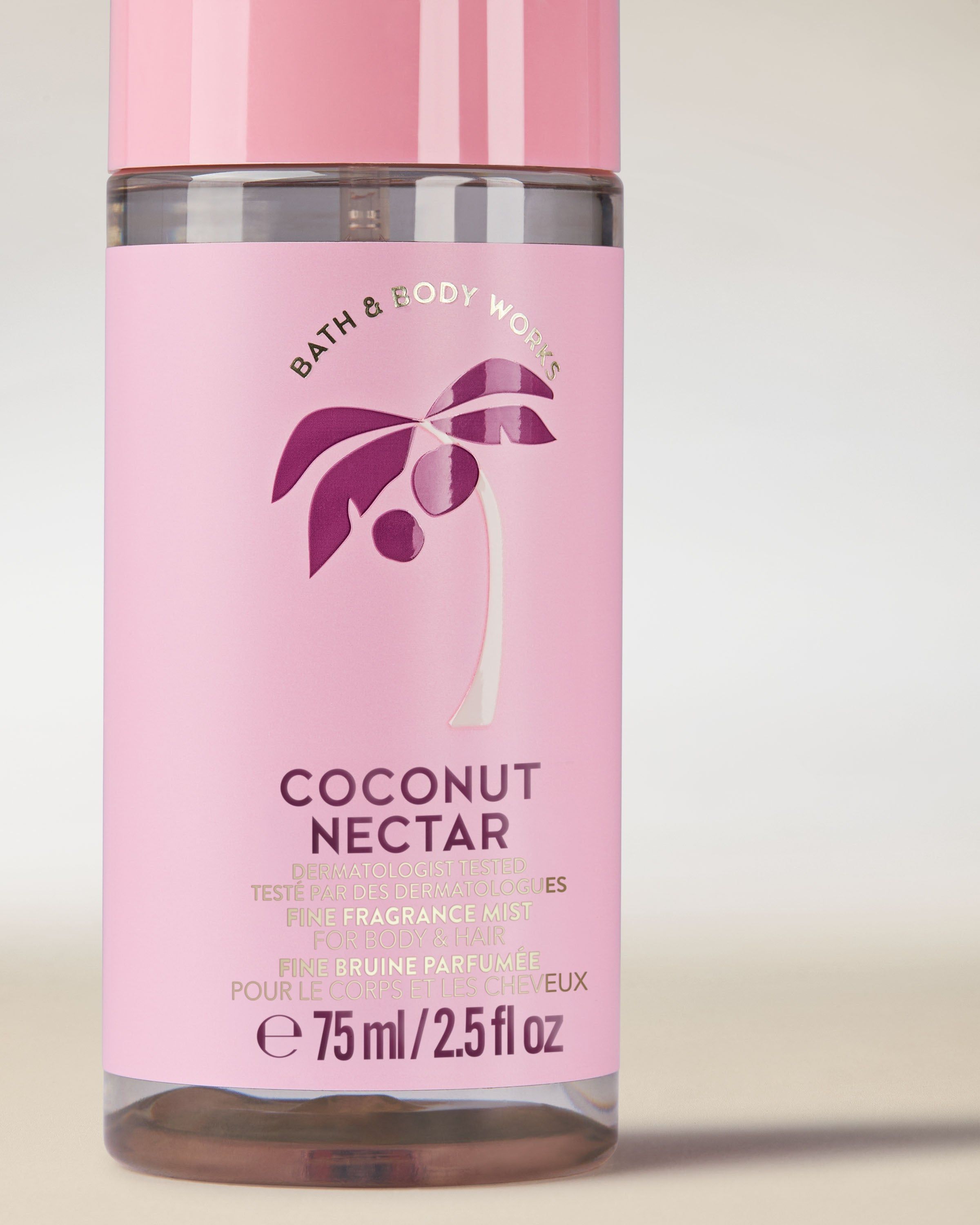 Ceață parfumată pentru corp și păr Coconut Nectar într‑o sticlă roz