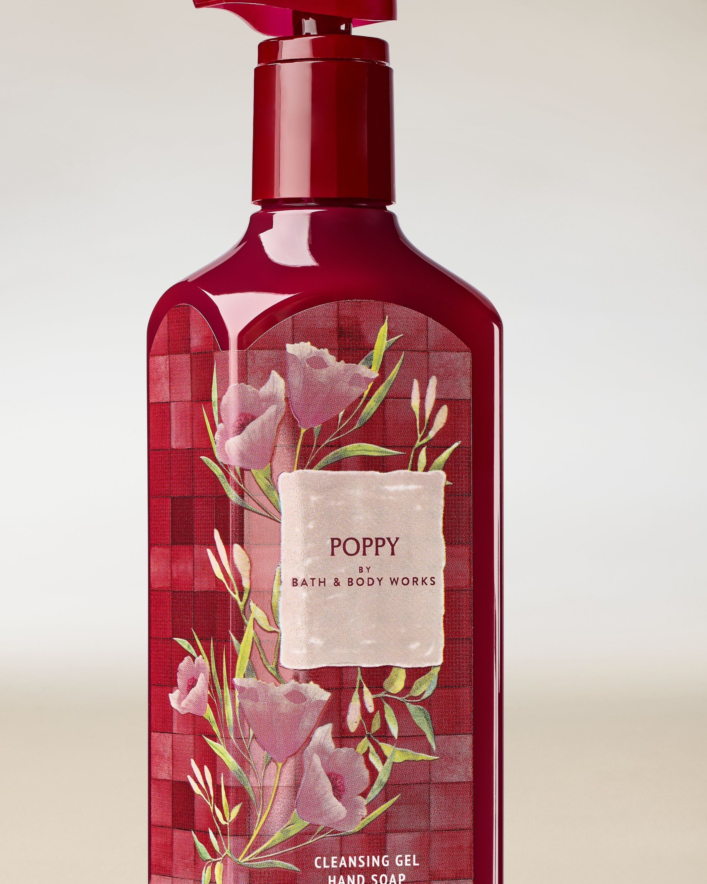 Gel pentru mâini Bath & Body Works Poppy 236 ml, în flacon bordo cu motiv floral.