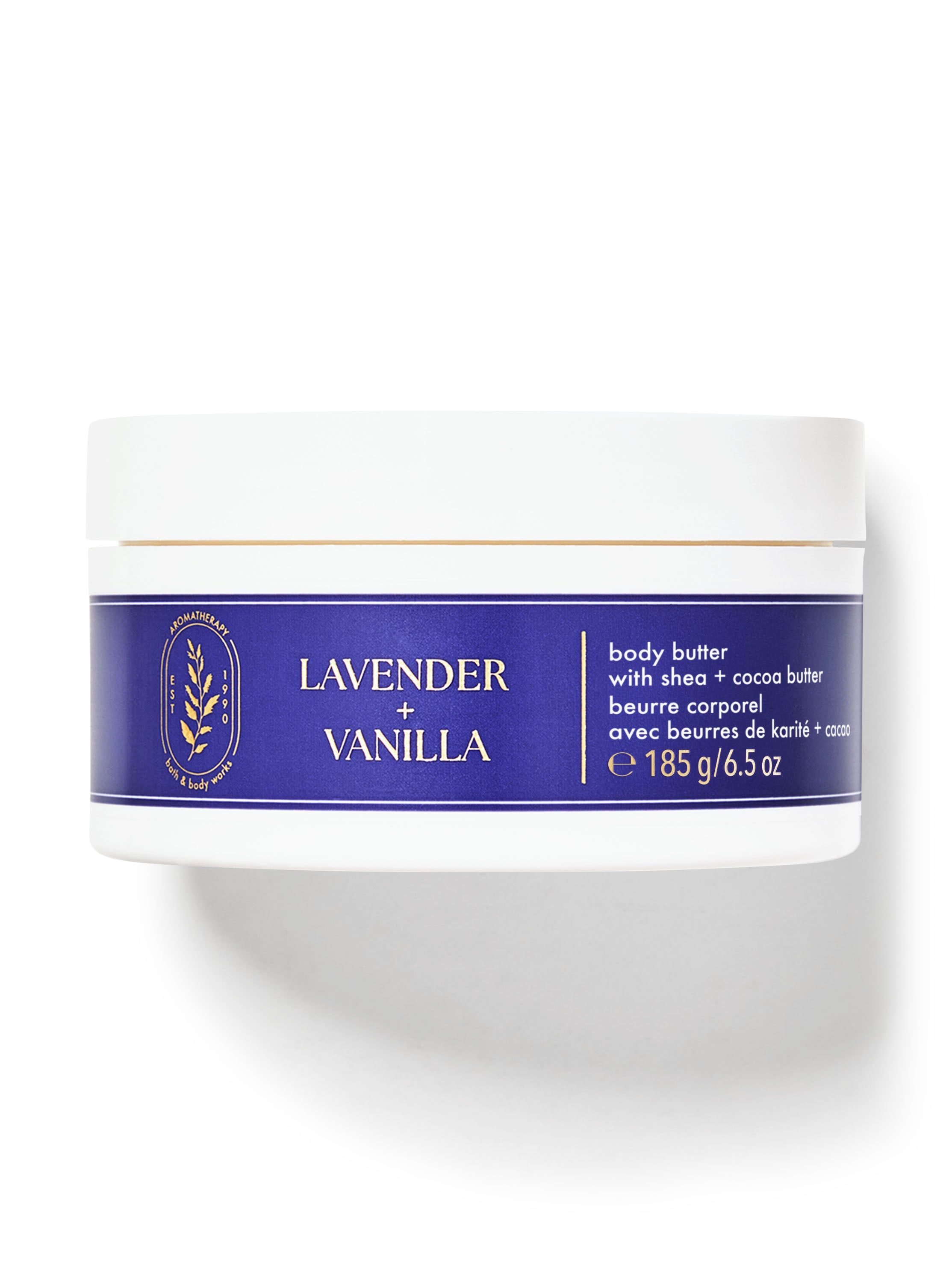 Unt de corp "Lavender + Vanilla" în borcan, cu etichetă albastră și frunze aurii. Bath & Body Works.