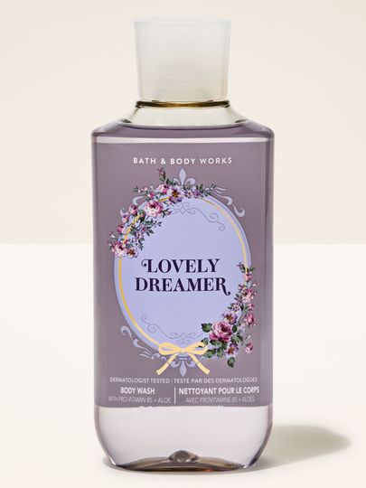 Gel de duș Lovely Dreamer de la Bath & Body Works, flacon mov cu capac flip-top și etichetă florală.