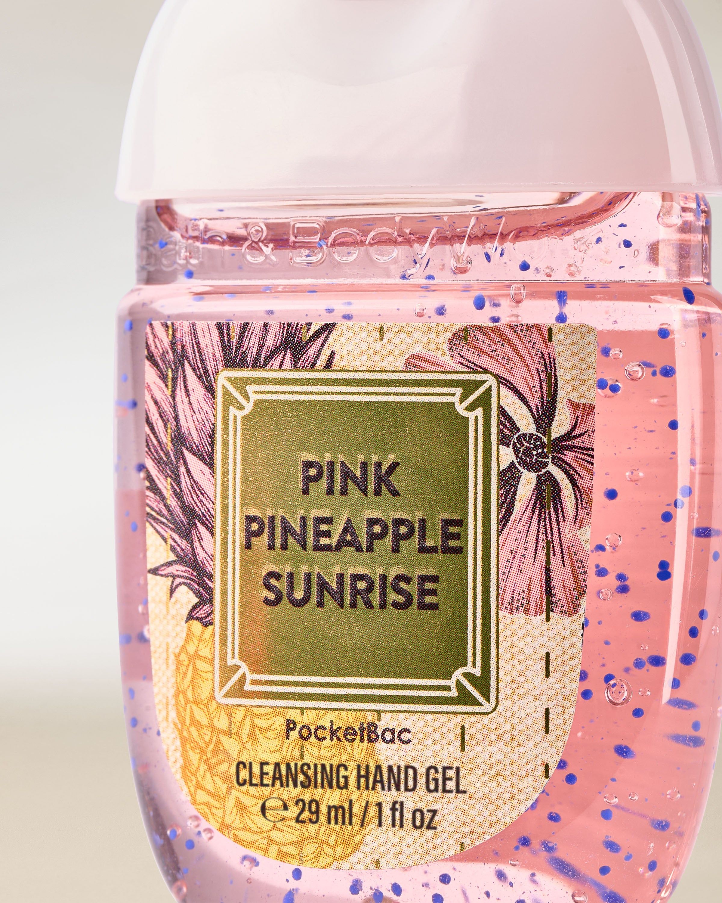 PocketBac Pink Pineapple Sunrise – gel de mâini în recipient roz cu capac alb și etichetă cu ananas.
