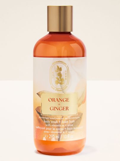 Gel de duș Bath & Body Works Aromatherapy Orange + Ginger 295 ml, în flacon portocaliu cu capac.